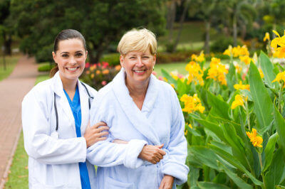 senior woman with a physician